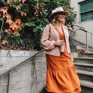 Light pink confetti, ballon sleeve cardigan.